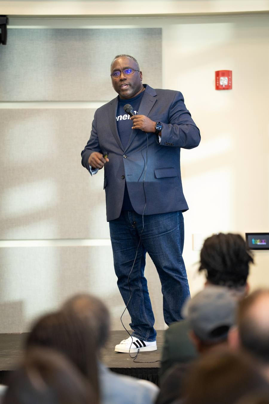 Dr. Frederick K. Johnson pitching Digital Therapeutix on stage